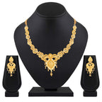 Gold necklace and earrings set on a black mannequin and stands with a white background