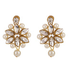 Pair of earrings with crystal and pearl design on a white background