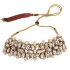 Decorative headband with pearls and crystals on a white background