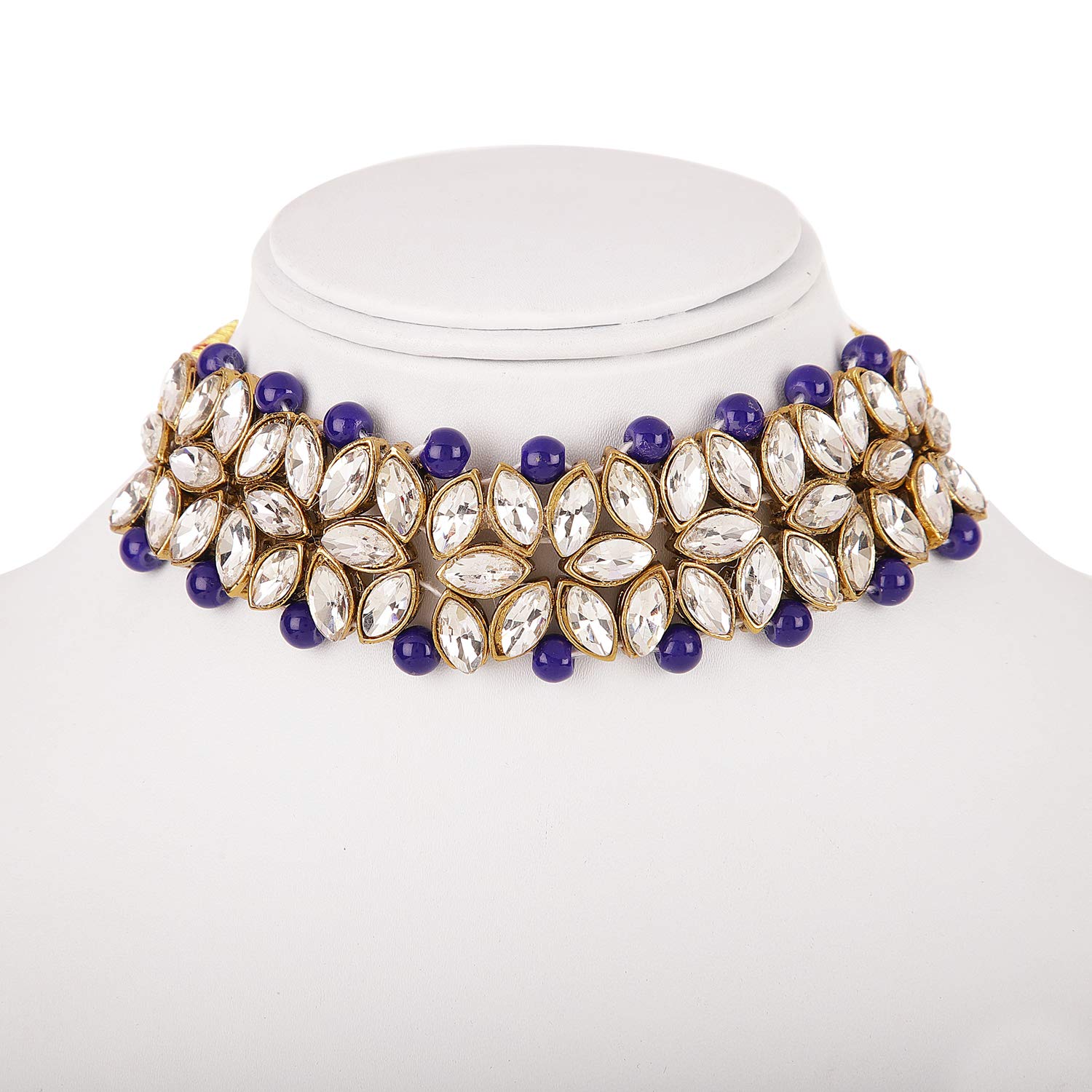Elegant necklace with purple and clear stones on a mannequin bust against a white background