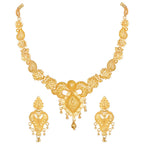 Gold necklace and earrings set on a white background