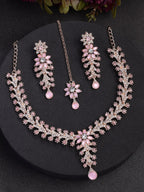 Jewelry set with necklace and earrings on a dark background